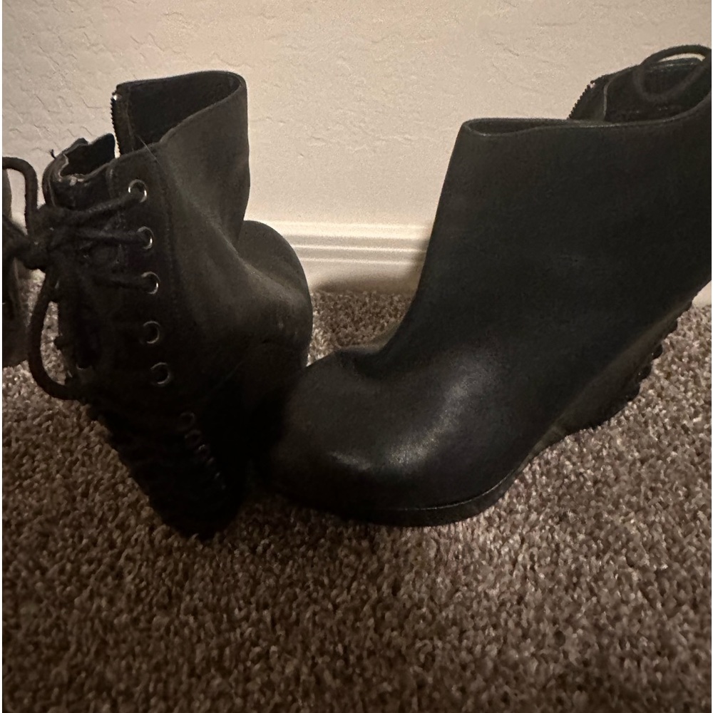 Black wedge booties that tie on the back..Gianni bini